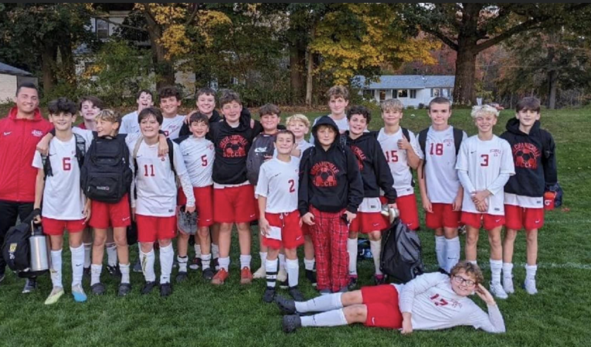 Modified Boys Soccer team standing in a group.