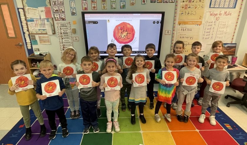 Elementary students standing in a group
