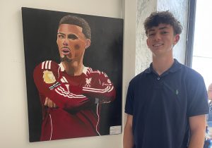 Mrs. Seymour's Drawing & Painting class went to the Legislative building in Albany to attend the 36th Annual New York State Art Teachers Association Legislative Student Art Exhibition. Jacob Hickey, shown here, was chosen to have work included in the show.